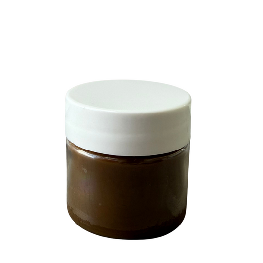 Image of Bare Skin. Cosmetics 0.5oz Raw Batana Oil against a White Background.
